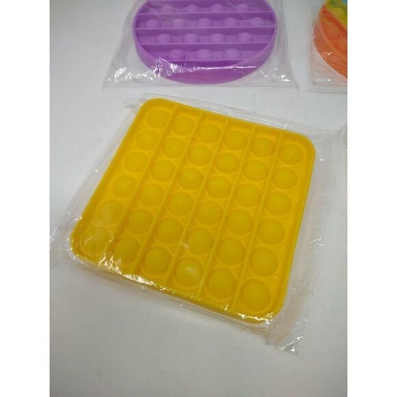 Push Pop Pop Bubble Sensory Fidget Toy Pack of 4 Multicolors Yellow Purple Fun - Picture 2 of 5
